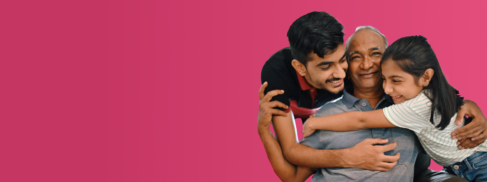 An man being hugged by his two children. The image is over a pink background.