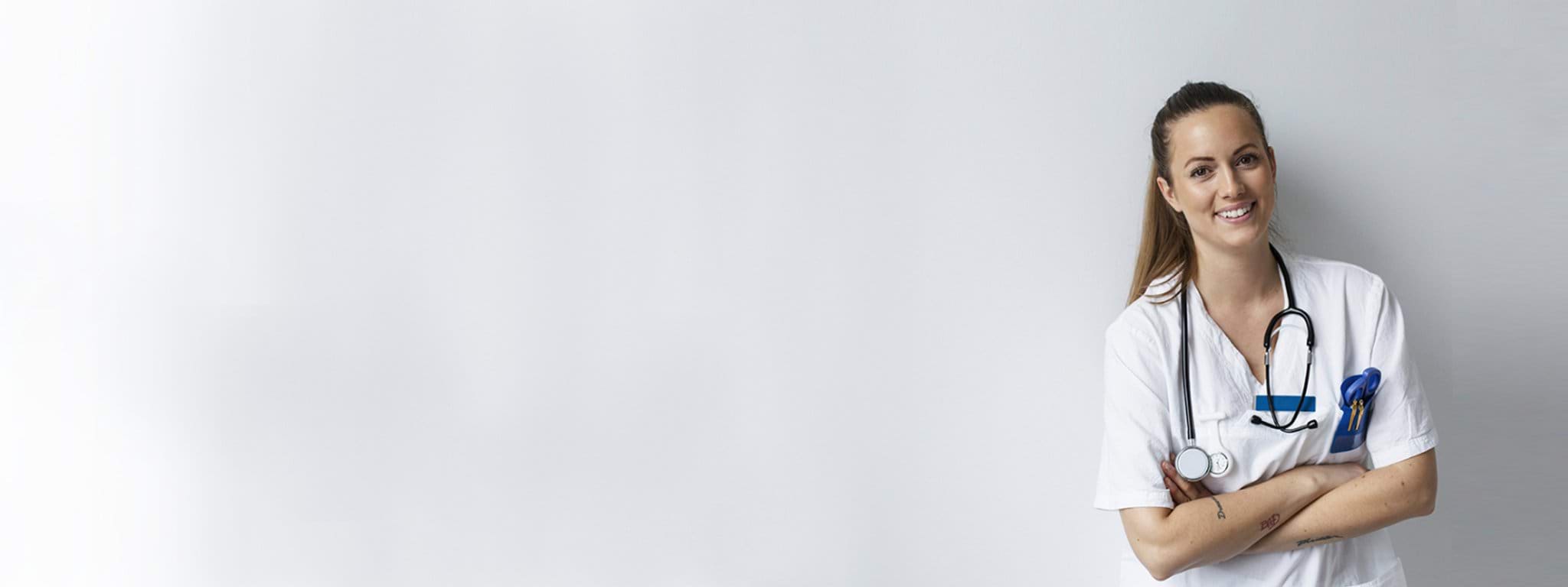 female healthcare working smiling at camera